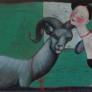 A girl with a goat